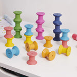 Rainbow wooden spools (21 pieces)